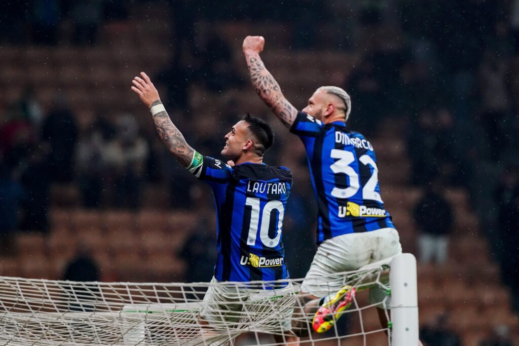 Inters Federico Dimarco and Inter?s Lautaro Martinez celebrate winning the Scudetto after the Serie A soccer match between Milan and Inter at San Siro stadium , north Italy - Monday 22 , April , 2024. Sport - Soccer . (Photo by Spada/LaPresse)
