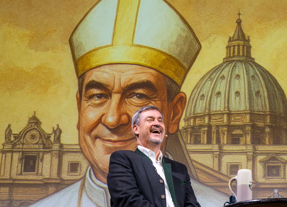 Markus Söder bei „Cathy’s Stammtisch“ vor einem mit KI erstellten Foto von ihm als Papst. Auf die Frage: „Lieber Papst oder US-Präsident?“, sagte Söder lachend: „Als Vater von vier Kindern wäre es ein steiler Move, wenn ich Papst werden wollte.“
